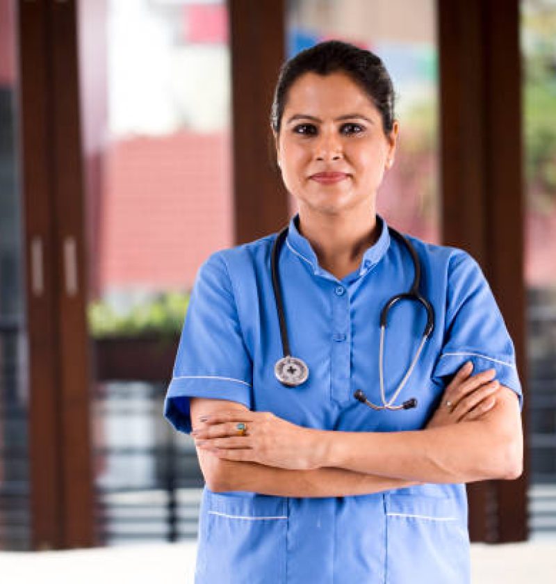 Smiling female nurse at hospital ward